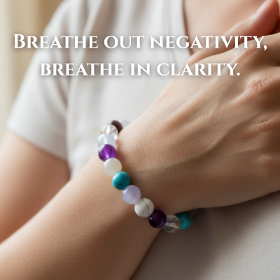 Woman wearing Calm Emotions gemstone bracelet with pause and breathe mindfulness message